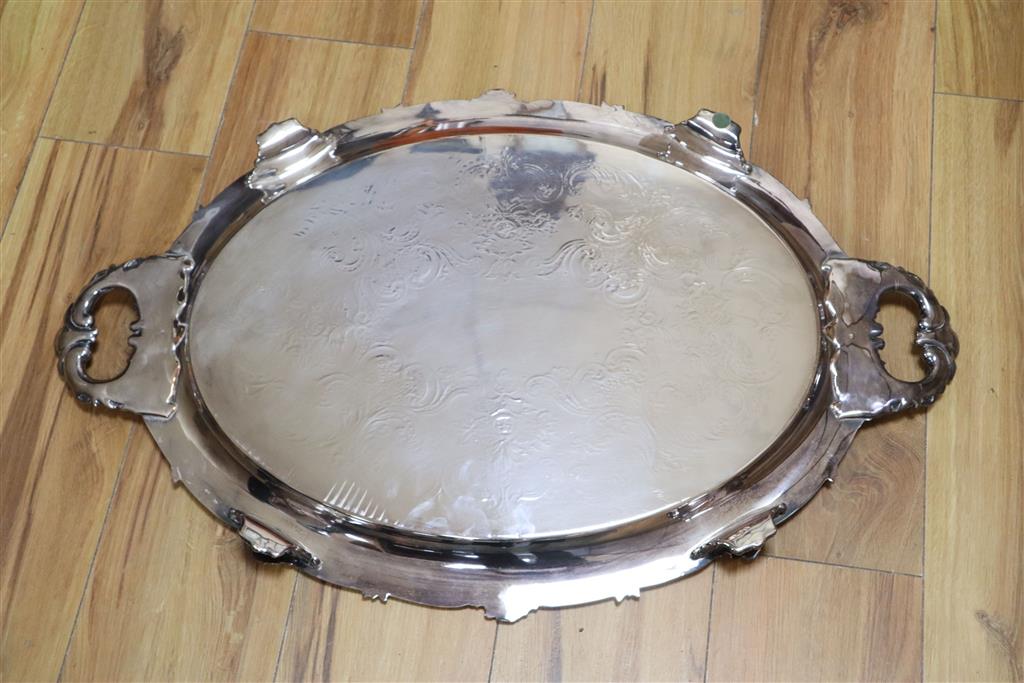 A late Victorian/Edwardian large oval silver-plated twin-handled tray with acanthus border, width 74cm inc. handles